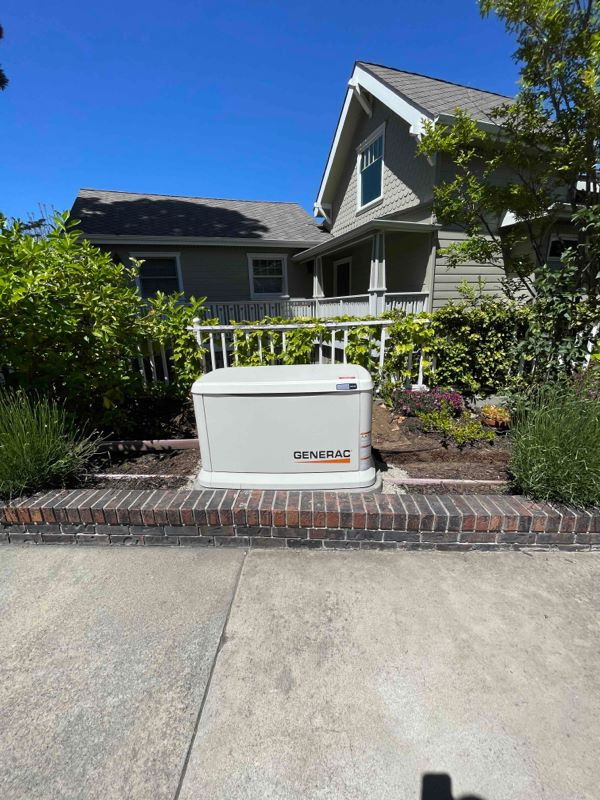 Generac generator installed in the backyard of a residential customers home