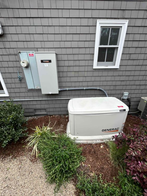 Generac generator installed next to the side of a residential clients home