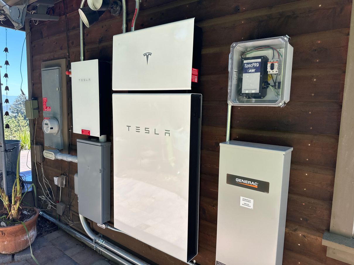 The surge protector, generator, and backup battery that were installed in a residential clients home